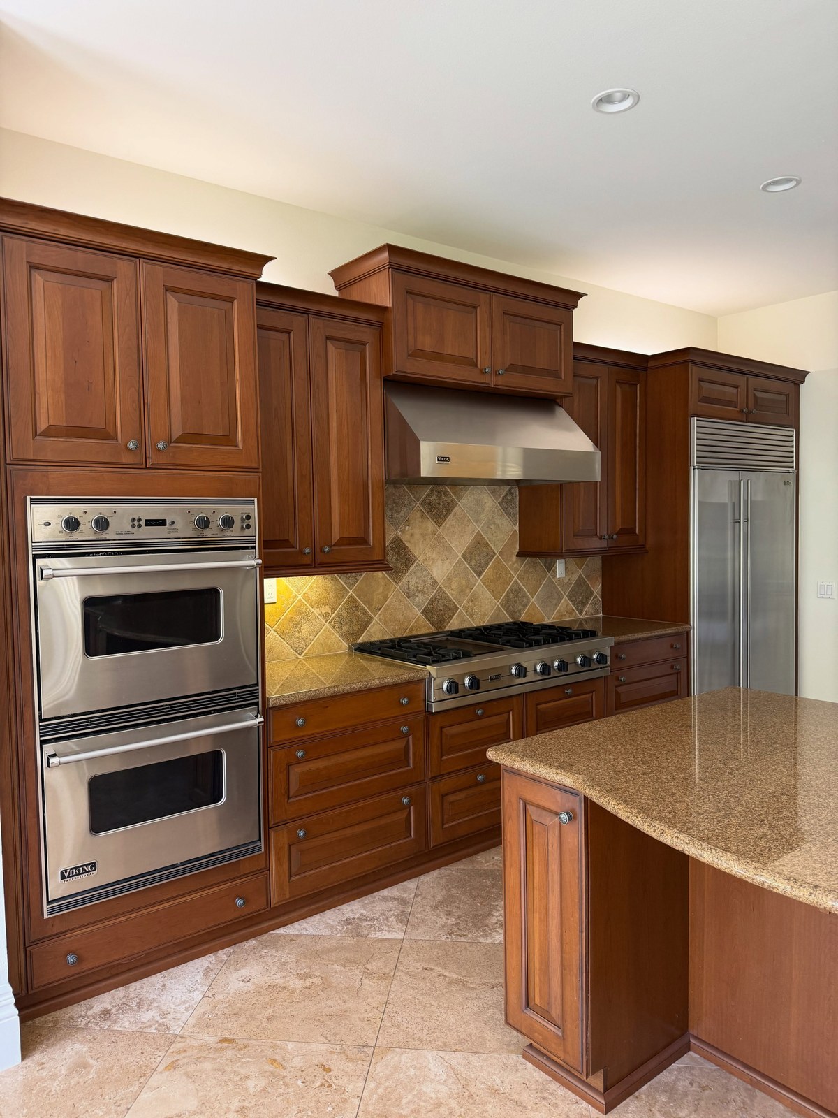 Newport Beach kitchen before remodel, dark traditional cabinets