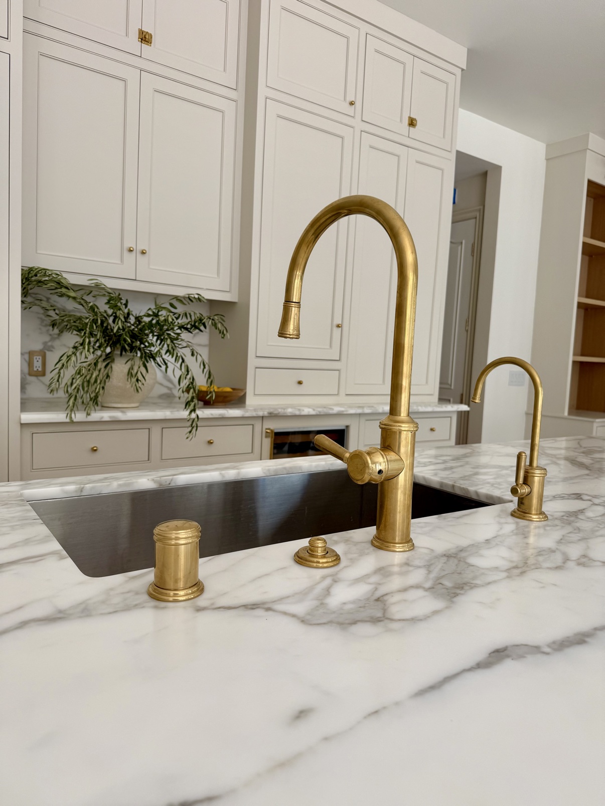 Brass faucet detail on marble